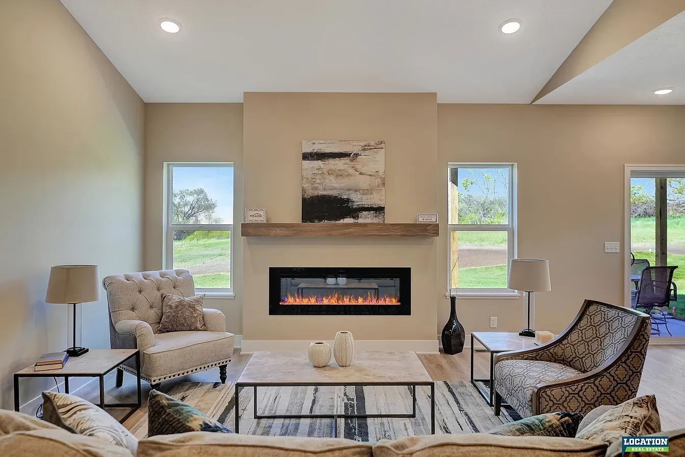 Prairie Home Builders living room with fireplace and open sight lines